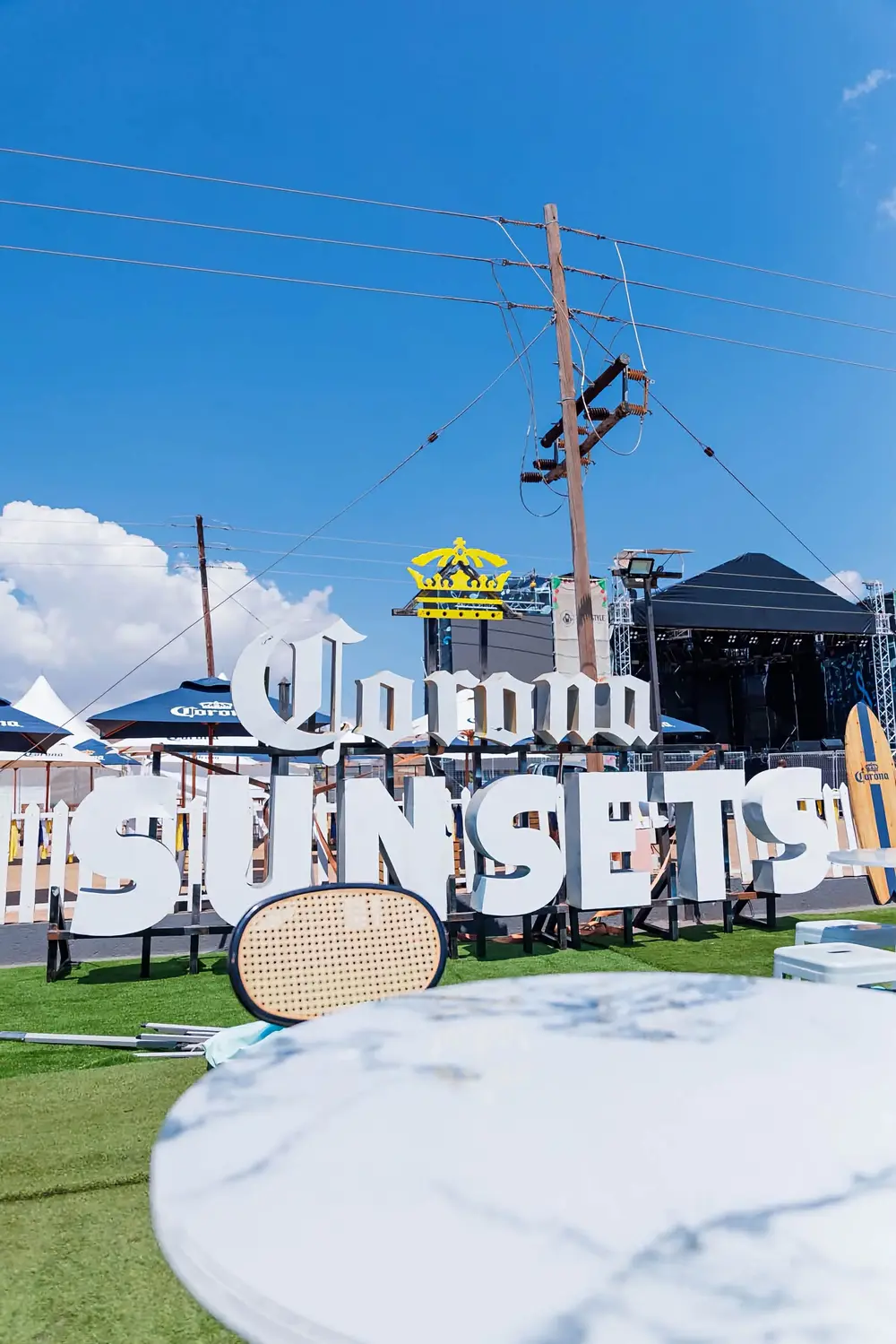 Giant Corona Sunsets letters in front of the stage